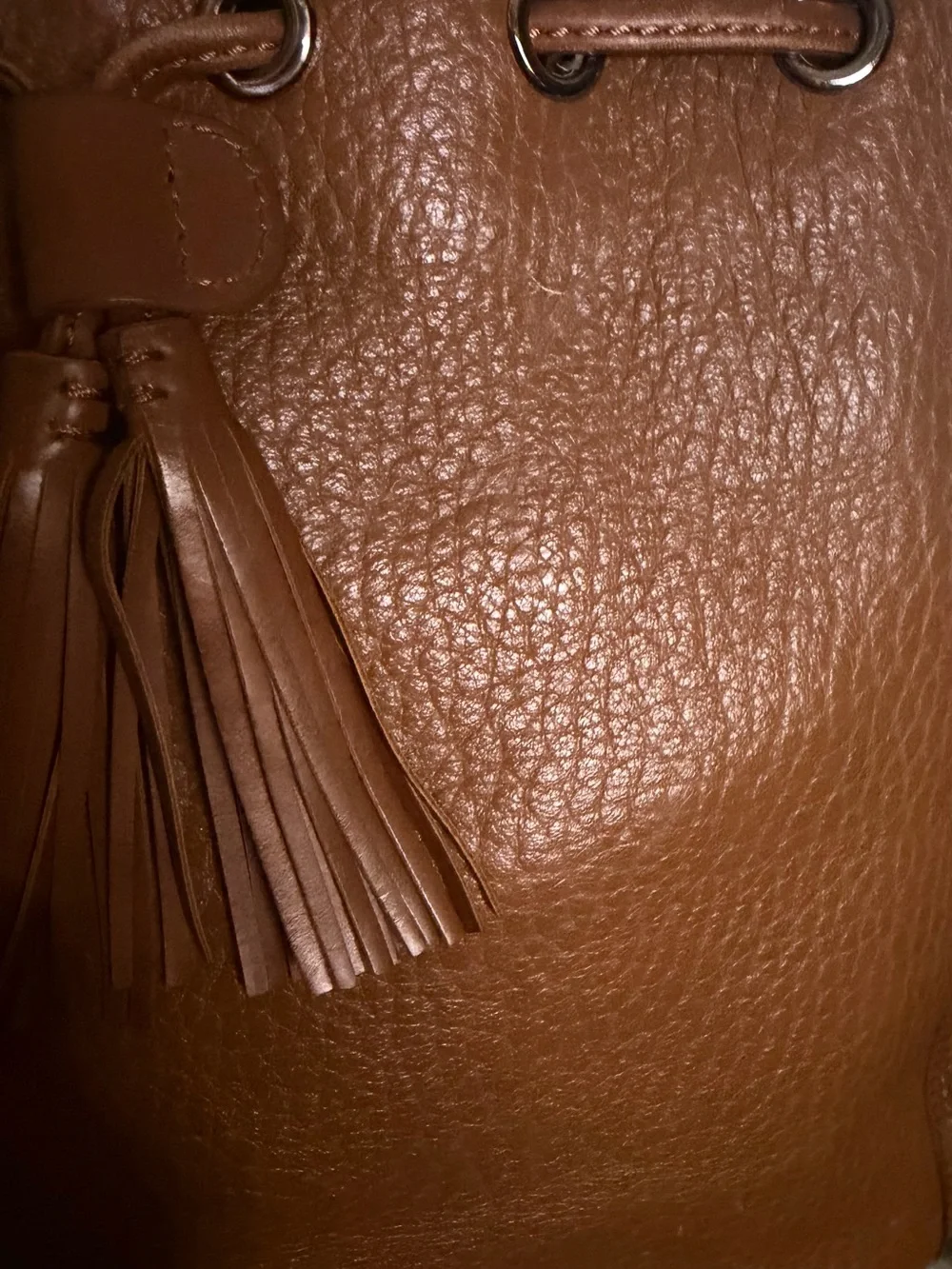 Stylish Tan Leather Satchel with Tassel Charm
